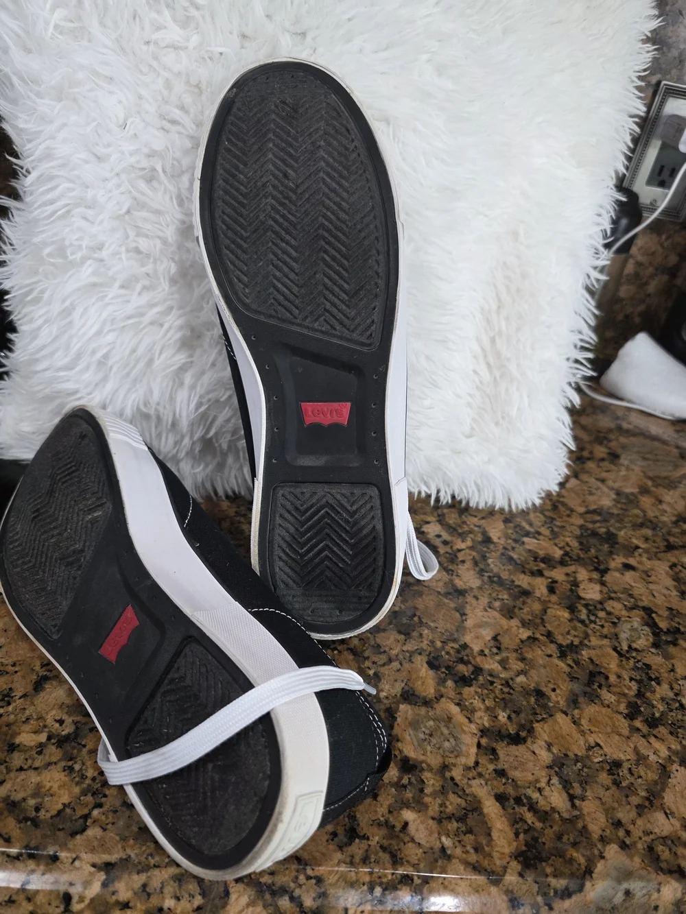 Levi's Men's Black Canvas Low-Top Sneakers with White Accents and Red Tab